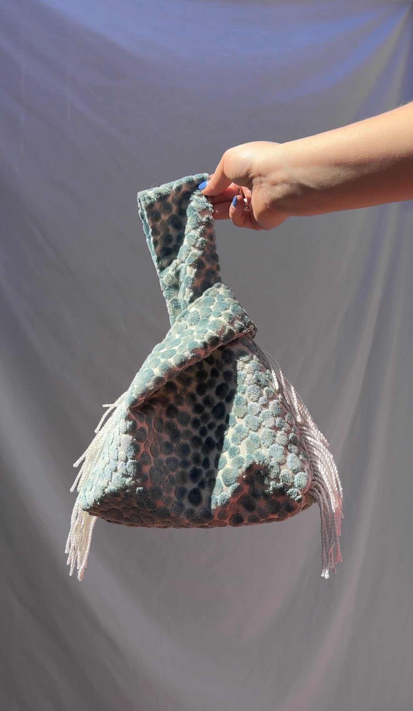 sassy dot bag on white background by elle jaye studios